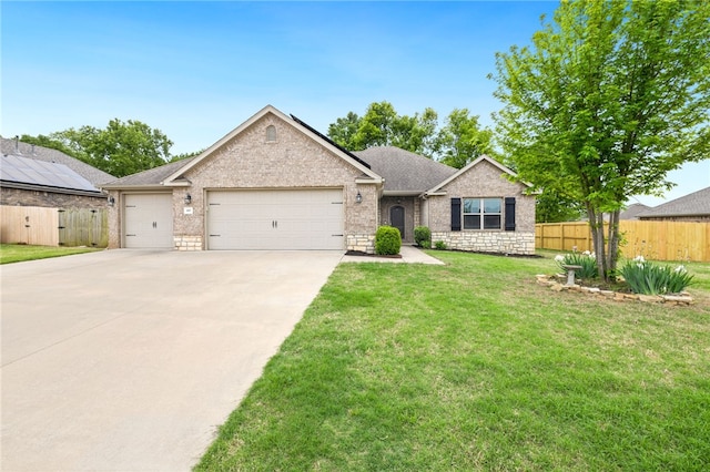 809 Sedgwick Dr, Prairie Grove, AR 72753 - ranch-style home with a front lawn, brick siding, concrete driveway, an attached garage, and fence