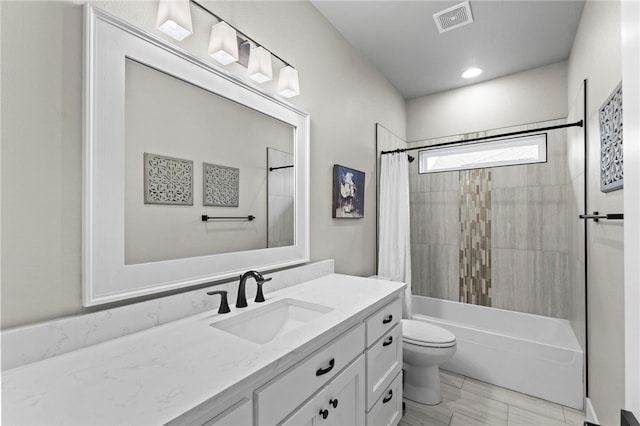 bathroom featuring visible vents, shower / tub combo, toilet, and vanity