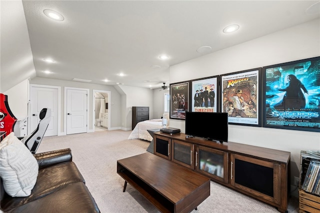 carpeted living room with baseboards, recessed lighting, ceiling fan, and lofted ceiling