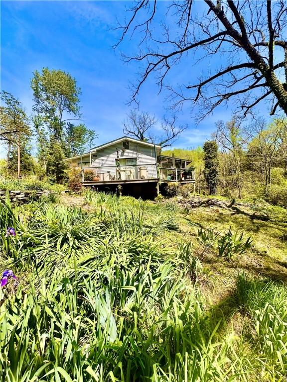 view of yard with a wooden deck
