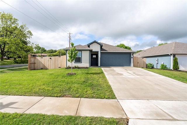 1300 Bates St, Gentry, AR 72734 - single story home with a garage, a gate, and driveway