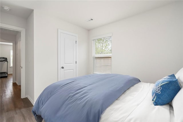 1300 Bates St, Gentry, AR 72734 - bedroom with wood finished floors and baseboards