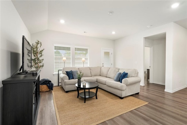 1300 Bates St, Gentry, AR 72734 - living area with wood finished floors, baseboards, and recessed lighting