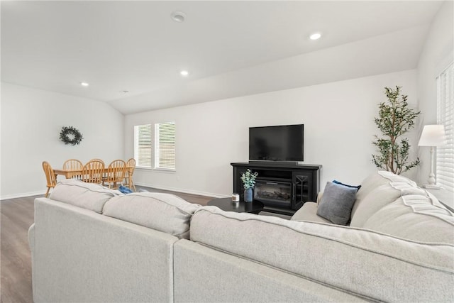 1300 Bates St, Gentry, AR 72734 - living room with wood finished floors, baseboards, lofted ceiling, and recessed lighting