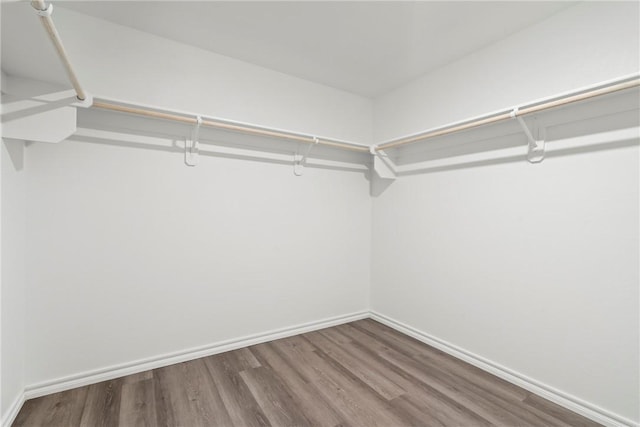 1300 Bates St, Gentry, AR 72734 - spacious closet with wood finished floors
