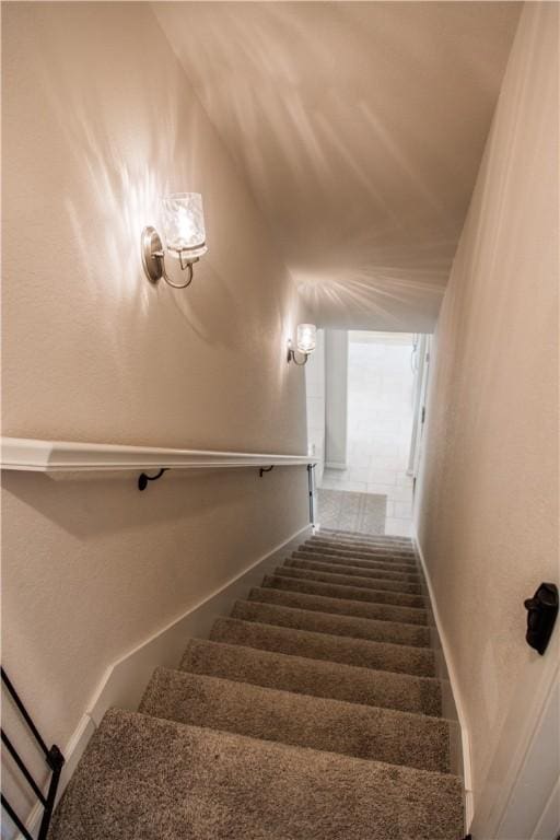 staircase with baseboards