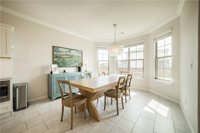 dining space with ornamental molding, an inviting chandelier, light tile patterned floors, and baseboards
