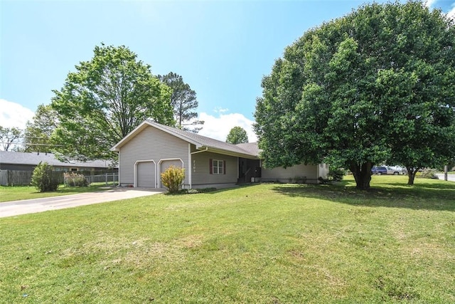 single story home with concrete driveway, a garage, a front lawn, and fence