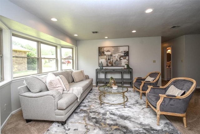 living room featuring visible vents, recessed lighting, and carpet flooring