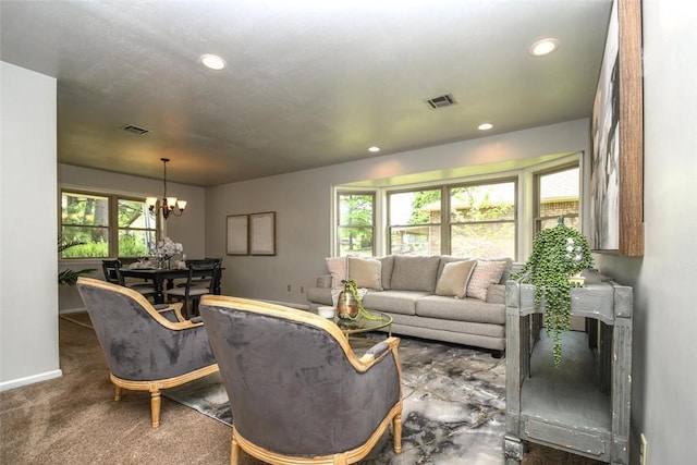 living area featuring visible vents, recessed lighting, a chandelier, and baseboards