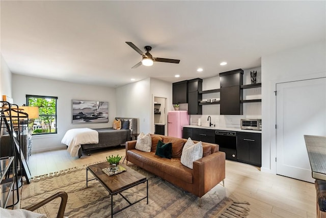 424 SE D St, Bentonville, AR 72712 - living area featuring recessed lighting, a toaster, light wood-style floors, ceiling fan, and baseboards