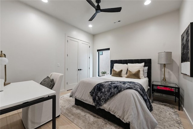 424 SE D St, Bentonville, AR 72712 - bedroom with visible vents, light wood-style floors, and recessed lighting