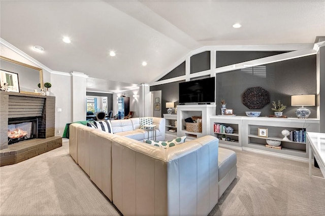 living area featuring a brick fireplace, lofted ceiling, ornamental molding, and light carpet