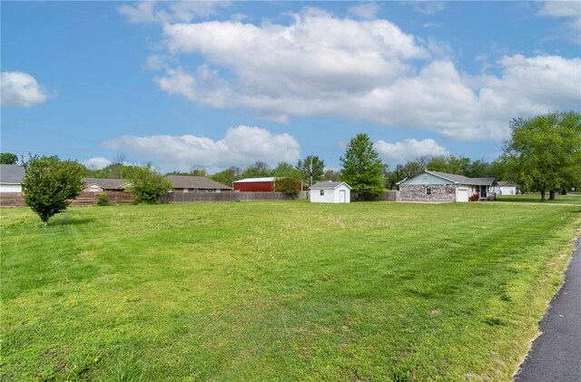 1622 2nd St, Westville, OK 74965 - view of yard featuring fence, a shed, and an outbuilding