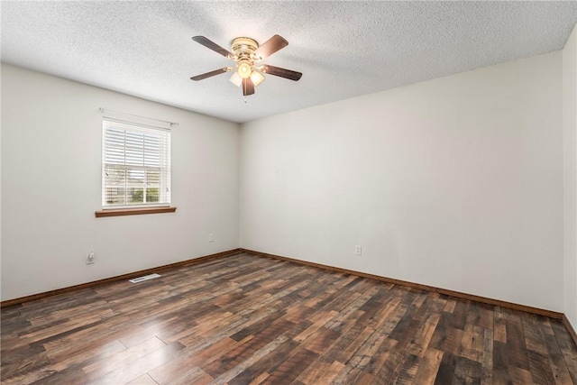 1622 2nd St, Westville, OK 74965 - unfurnished room featuring ceiling fan, visible vents, baseboards, a textured ceiling, and wood finished floors