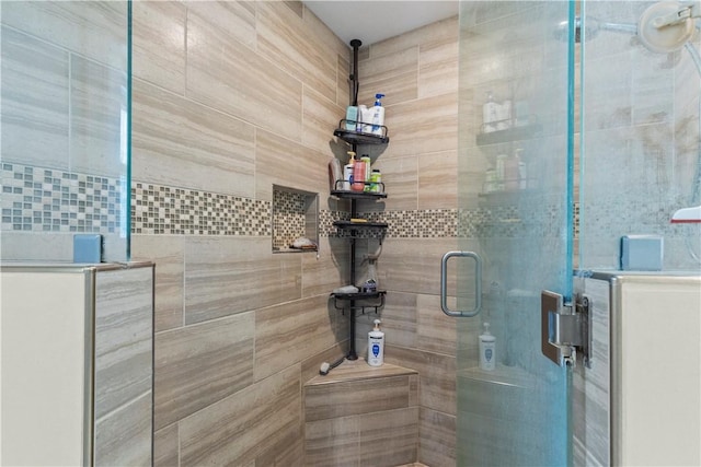 full bathroom with a shower stall