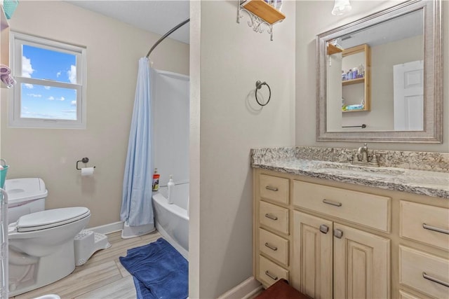 full bathroom with toilet, shower / bathtub combination with curtain, vanity, and baseboards