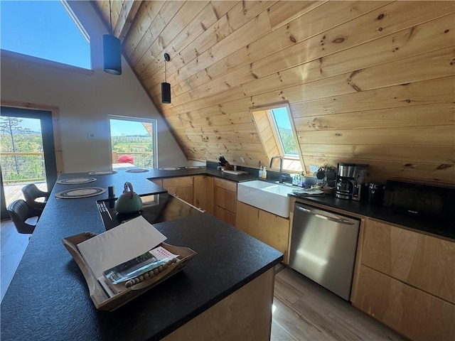 794 NC-3986, Jasper, AR 72641 - kitchen featuring lofted ceiling with beams, a healthy amount of sunlight, light brown cabinets, dishwasher, and a sink