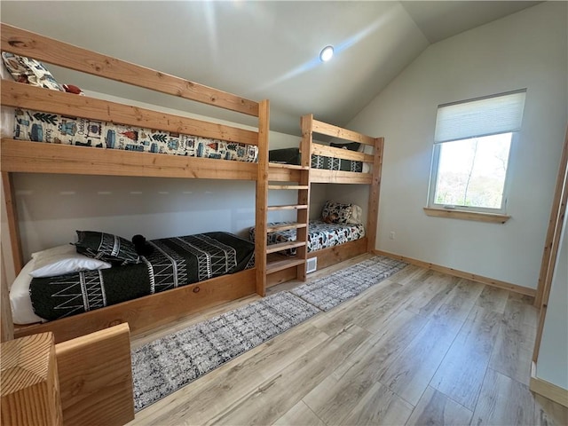 794 NC-3986, Jasper, AR 72641 - bedroom with vaulted ceiling, wood finished floors, and baseboards