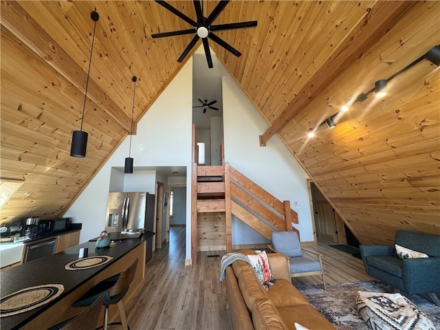 794 NC-3986, Jasper, AR 72641 - living room featuring wood finished floors, stairs, wood ceiling, vaulted ceiling, and ceiling fan