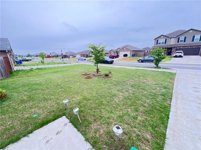 view of yard featuring a residential view
