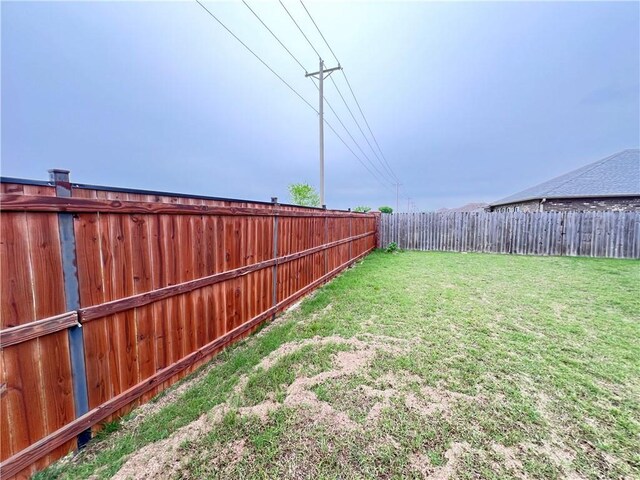 view of yard featuring a fenced backyard