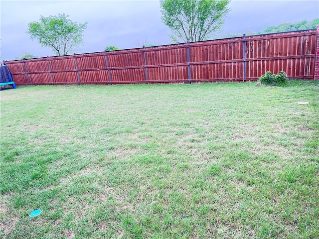view of yard featuring fence