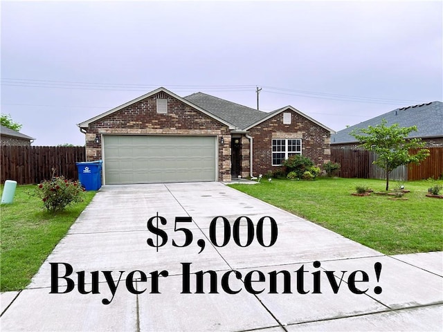 single story home featuring brick siding, fence, a garage, a front yard, and concrete driveway