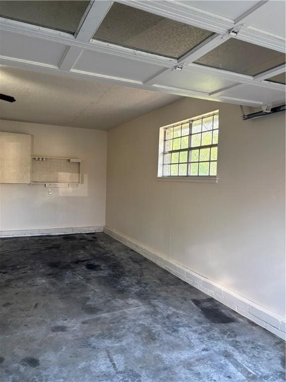 garage featuring baseboards