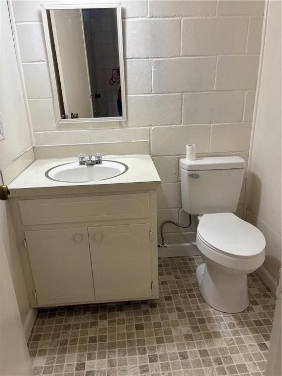 half bath with toilet and vanity