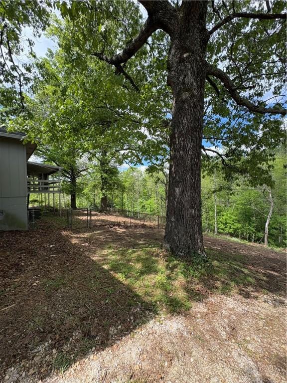 8455 Par Ln, Rogers, AR 72756 - view of yard featuring fence