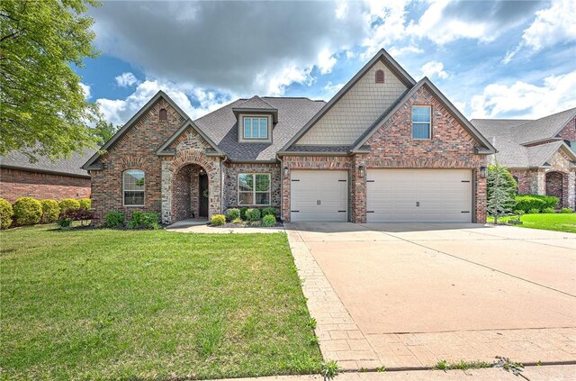 craftsman-style house with brick siding, concrete driveway, a front lawn, and an attached garage