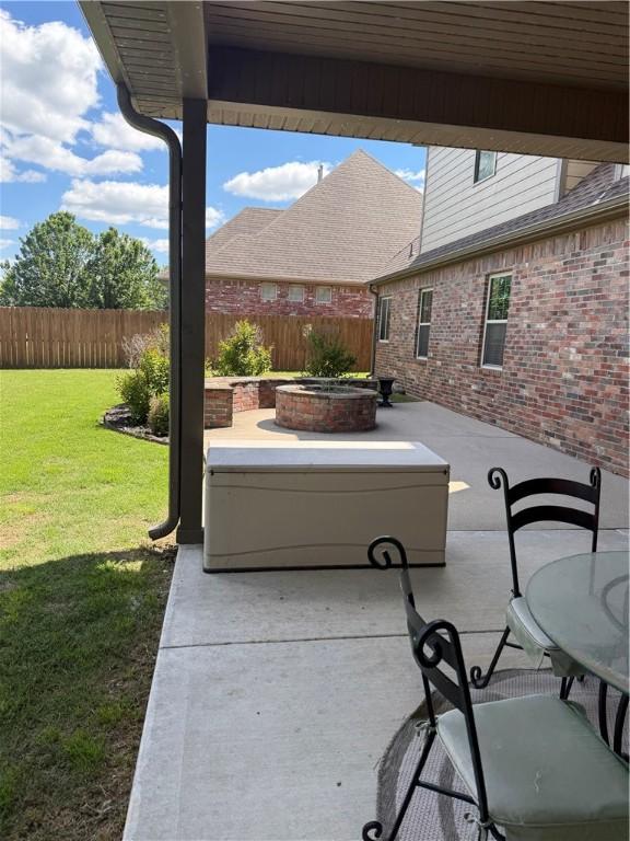 view of patio / terrace featuring a fire pit