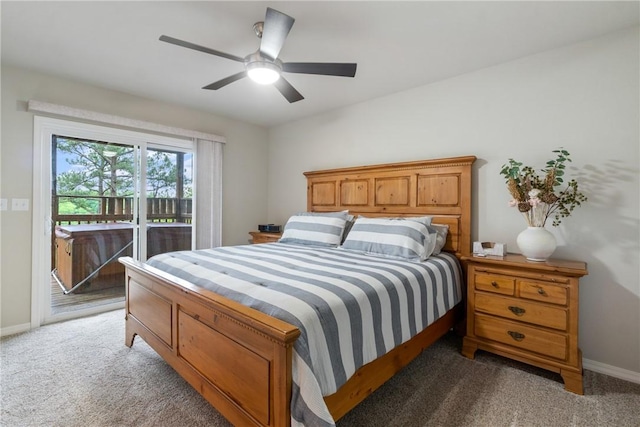 15 Serenity Ln, Holiday Island, AR 72631 - bedroom featuring access to exterior, light colored carpet, and a ceiling fan