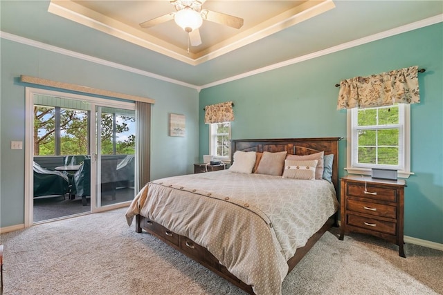 15 Serenity Ln, Holiday Island, AR 72631 - bedroom featuring access to outside, a raised ceiling, carpet flooring, a ceiling fan, and crown molding