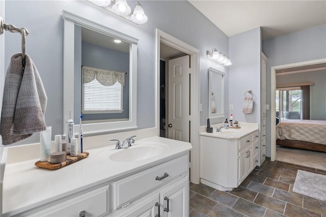 15 Serenity Ln, Holiday Island, AR 72631 - full bathroom featuring two vanities, stone finish flooring, and ensuite bath