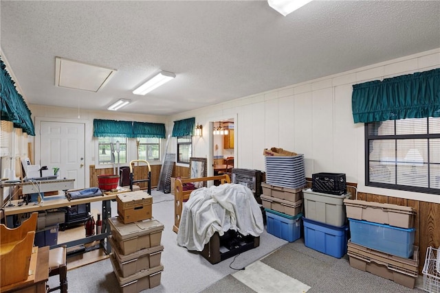 storage room featuring attic access