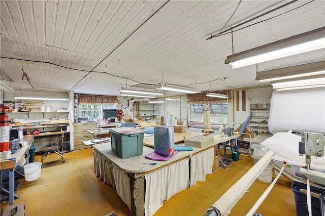 misc room with a workshop area