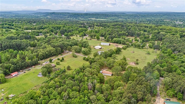 aerial view featuring a wooded view