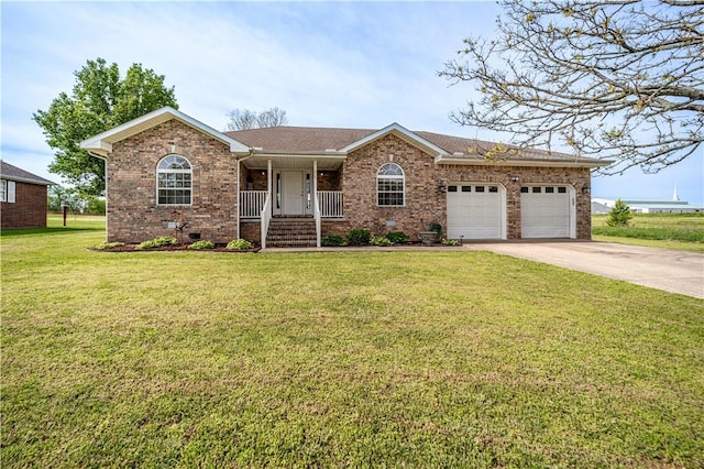 ranch-style home with a porch, brick siding, a garage, driveway, and a front lawn