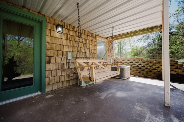 1010 Ashley Ln, Pea Ridge, AR 72751 - view of patio / terrace featuring central AC and covered porch