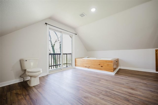 1010 Ashley Ln, Pea Ridge, AR 72751 - bonus room featuring wood finished floors, lofted ceiling, and baseboards