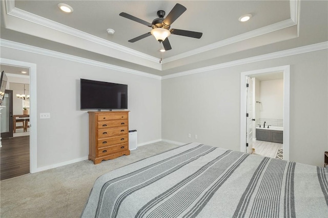 carpeted bedroom featuring crown molding, recessed lighting, a raised ceiling, and baseboards