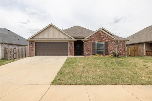 ranch-style house with fence, a front yard, brick siding, and a garage