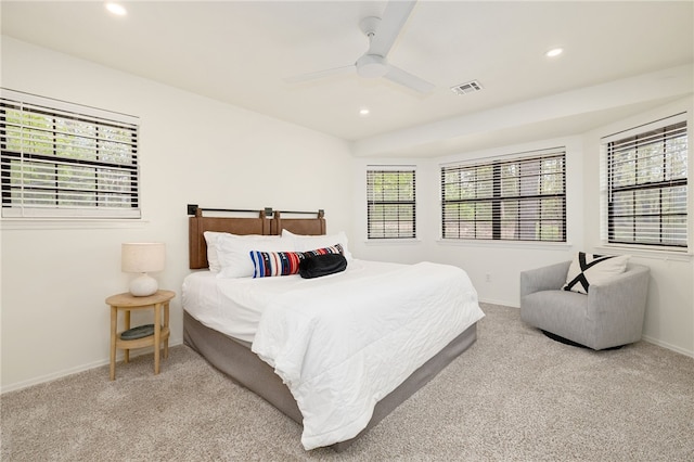 carpeted bedroom featuring baseboards, a ceiling fan, recessed lighting, and visible vents