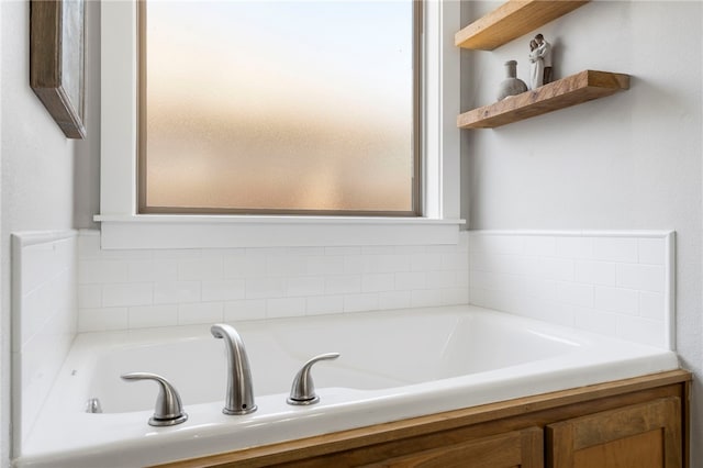 bathroom featuring a bath