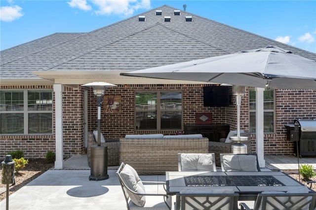 view of patio featuring outdoor dining space, area for grilling, and outdoor lounge area