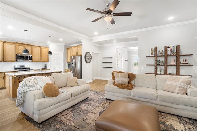 living room featuring recessed lighting, ceiling fan, and light wood finished floors
