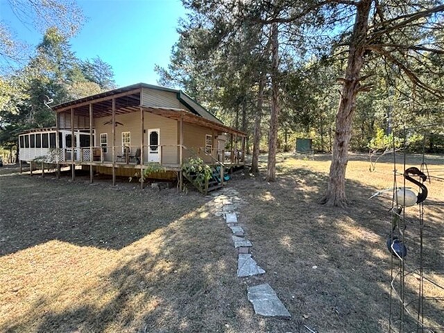 2525 Dustin Ln, Omaha, AR 72662 - exterior space with ceiling fan and a wooden deck