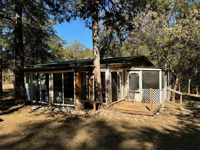 2525 Dustin Ln, Omaha, AR 72662 - back of house with a sunroom and a wooden deck